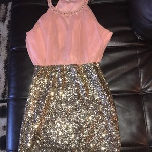 Pink/ peach top dress with sparkling bottom.